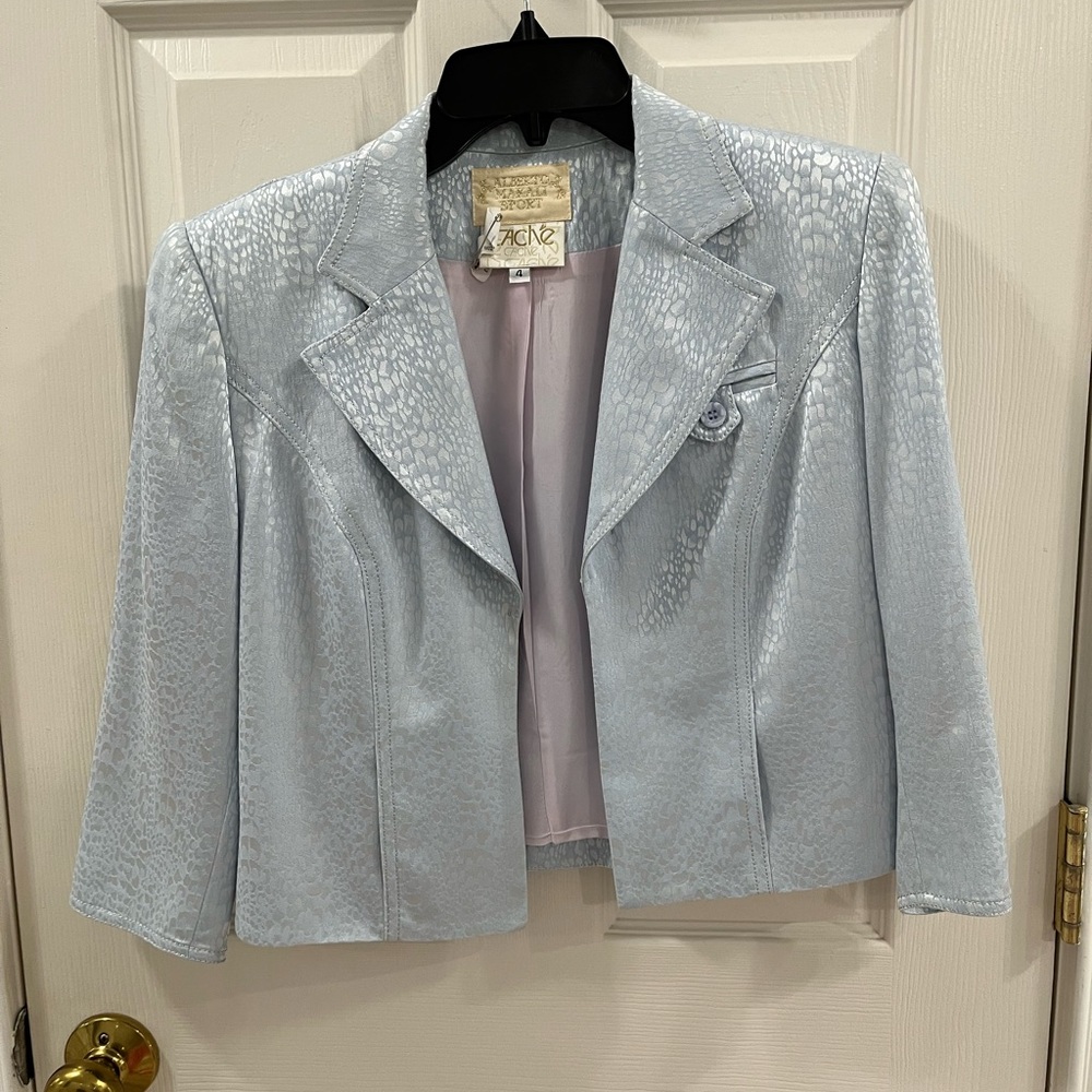 Alberto Makali, ice blue jacket. I’m 5’3” and 110 lbs.